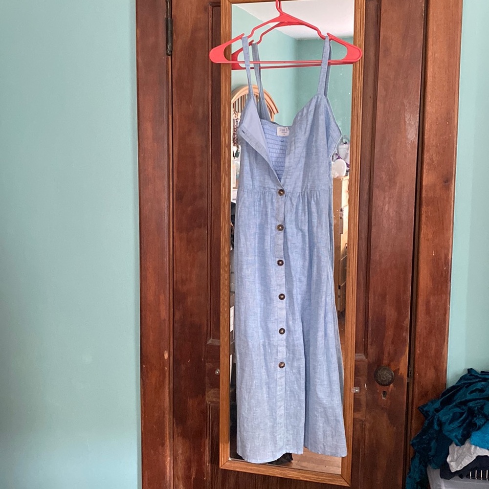Sienna Sky medium dress with buttons down. From Marshall's